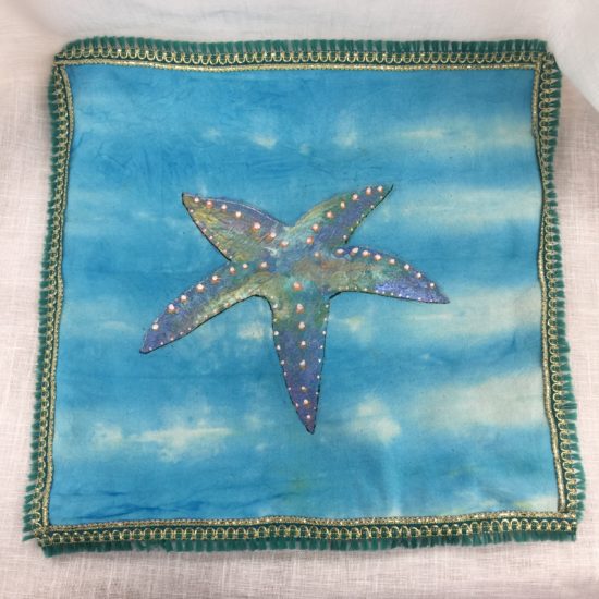 Hand painted and tie-dyed cushion cover with Starfish design
